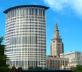 two buildings with a sky view in the background