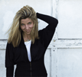 a woman wearing a suit